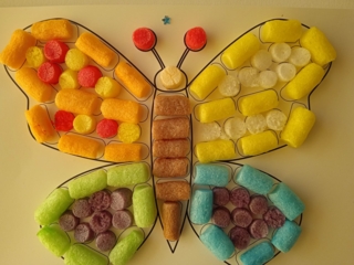 Réalisation d'un papillon en  flocons de maïs - Flocons de maïs - 10doigts.fr